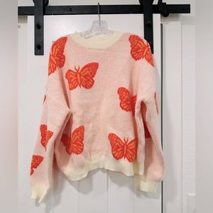 SHEIN pink and orange butterfly sweater.
